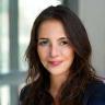 Professional portrait of Isabelle Moreau, CEO at Global Tech Solutions.